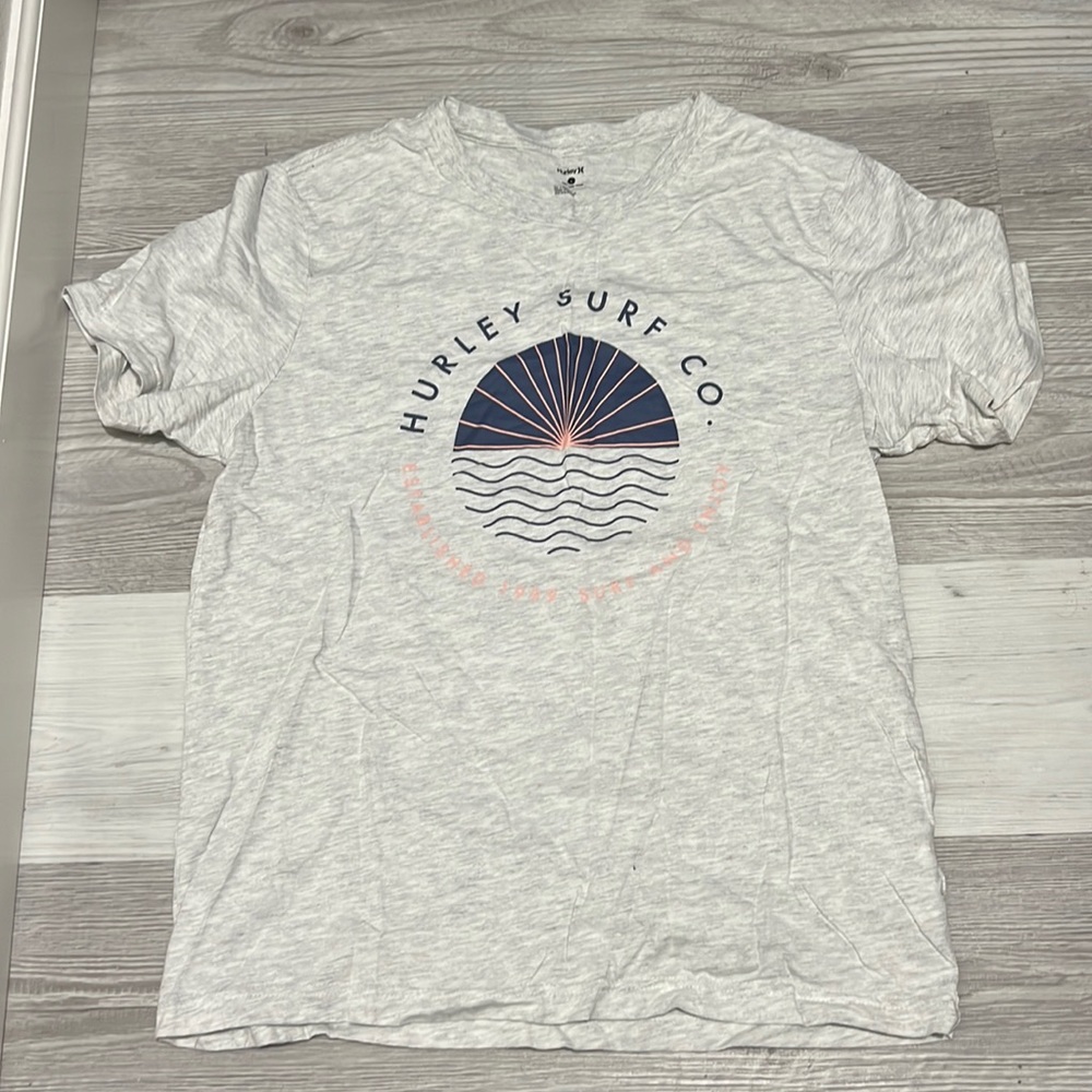 Hurley shirt. Women’s size L. Never worn. No tag.